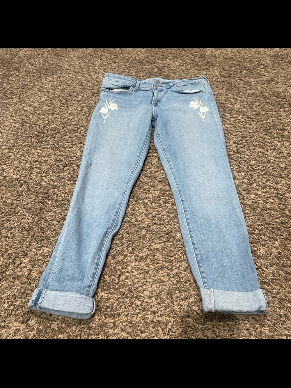 Levi’s 711 skinny jeans with embroidered flowers size 31